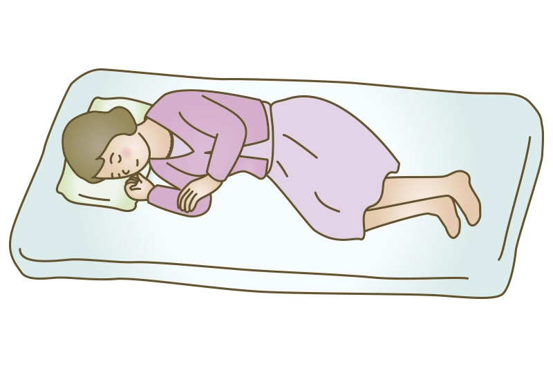 横向きで膝を曲げる