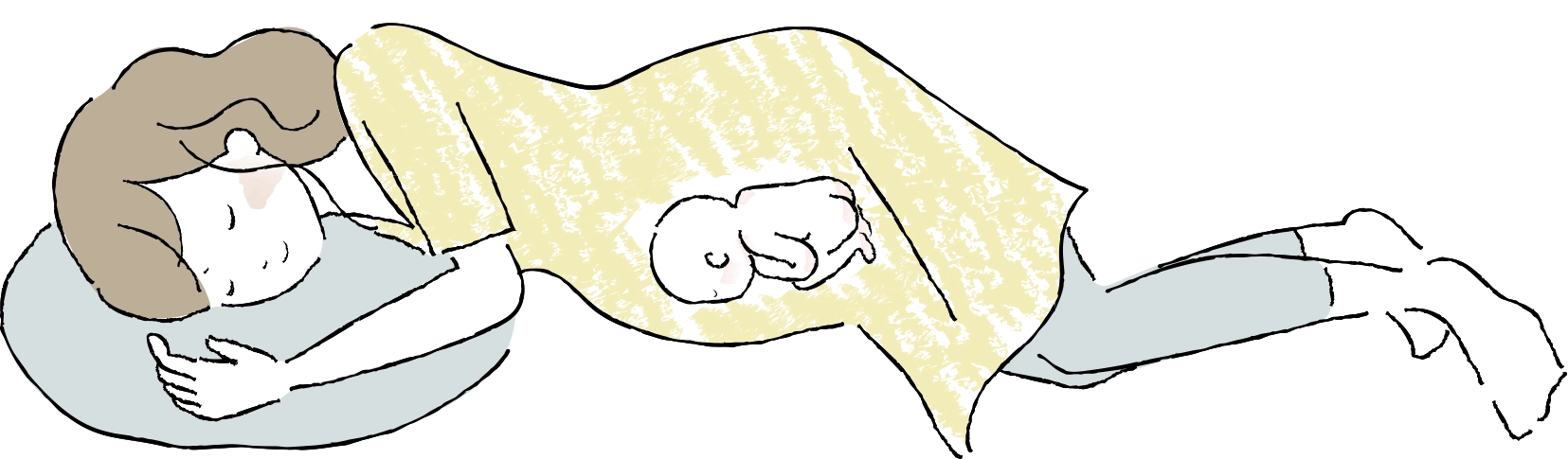 横向きで眠る妊婦さん